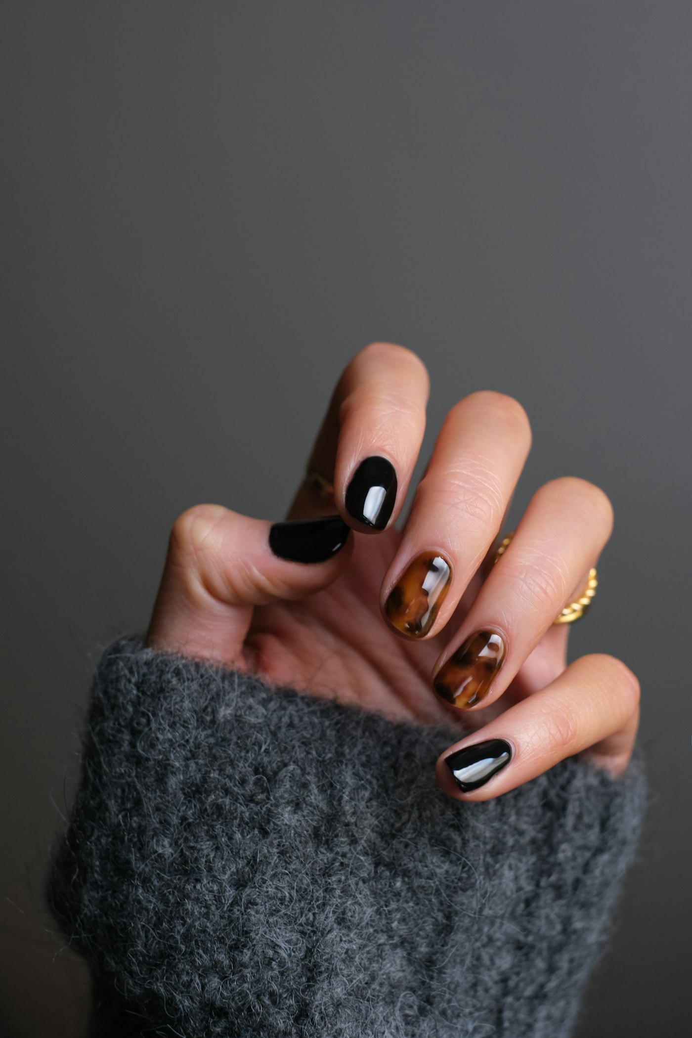 A finished manicure with nail art from the nail studio